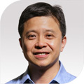 Hsiao-Wuen Hon smiling for the camera
